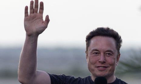 Musk waves during a press conference at the SpaceX Starbase in Brownsville, Texas.