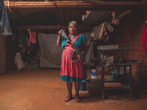 Portrait of a volunteer of the police community of CRAC-PF in her house, in Rincon De Chautla. Women and children have taken up arms after the several attacks by the criminal group of Los Ardillos.