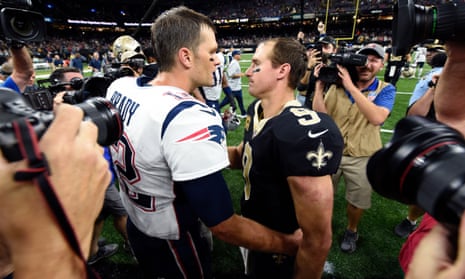 Tom Brady and Drew Brees chat to each other after a Patriots-Saints game in 2017