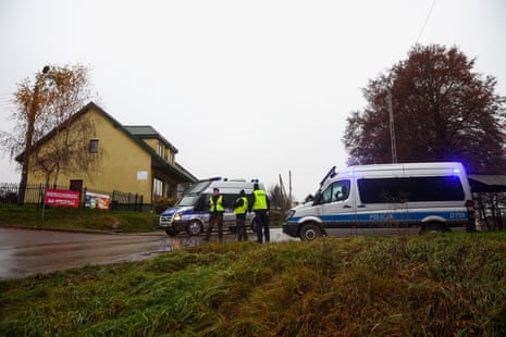 Police officers stand at a blockade after an explosion in Przewodów, a village in eastern Poland near the border with Ukraine, November 16.