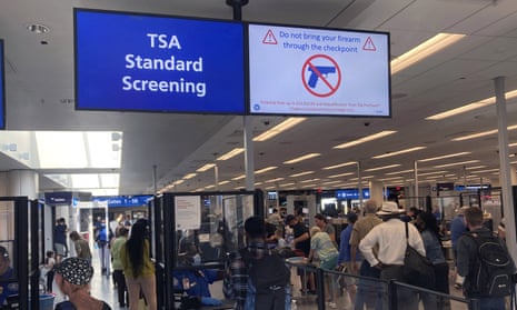 Airport standard screening with a queue.