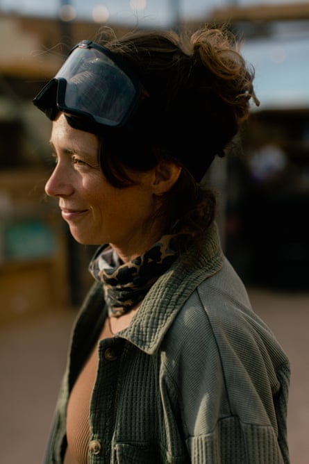 Portrait of a woman with goggles on her head