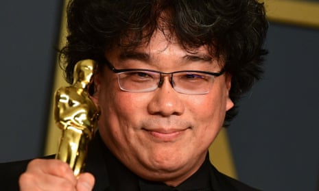 FILES-US-ENTERTAINMENT-POLITICS-TRUMP<br>(FILES) In this file photo “Parasite” director Bong Joon-ho pose in the press room with his Oscars during the 92nd Oscars at the Dolby Theater in Hollywood, California on February 9, 2020. - President Donald Trump on Thursday scorned the best picture Oscar for South Korean film “Parasite,” asking how a foreign movie could get the honor. “How bad was the Academy Awards this year?” Trump asked the crowd at a packed reelection campaign rally in Colorado Springs, Colorado. (Photo by FREDERIC J. BROWN / AFP) (Photo by FREDERIC J. BROWN/AFP via Getty Images)
