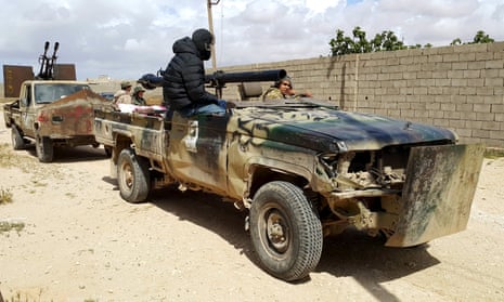 Forces loyal to Libya’s eastern government in clashes in Benghazi with Islamist group Ansar al-Sharia.