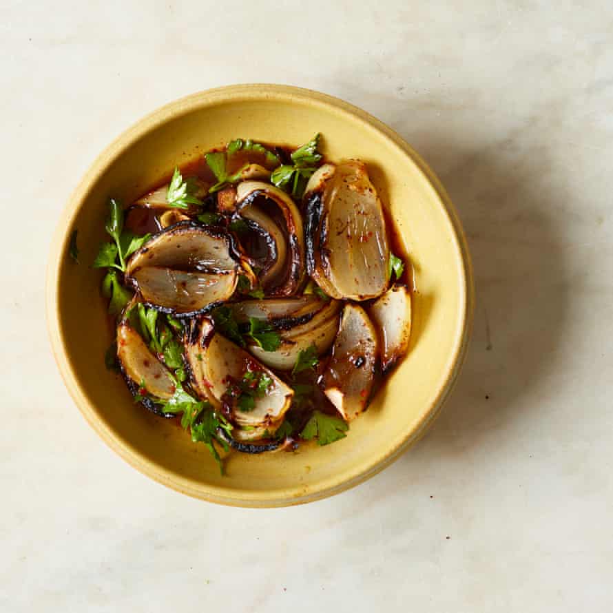 Yasmin Khan’s grilled onion salad with pomegranate and sumac.