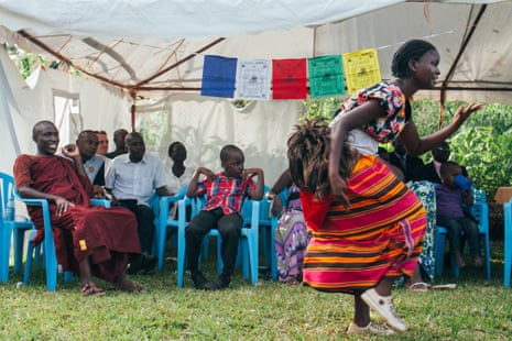 A dancer from the Acholi people from northern Uganda performs at the centre for the Vesak day festivities.