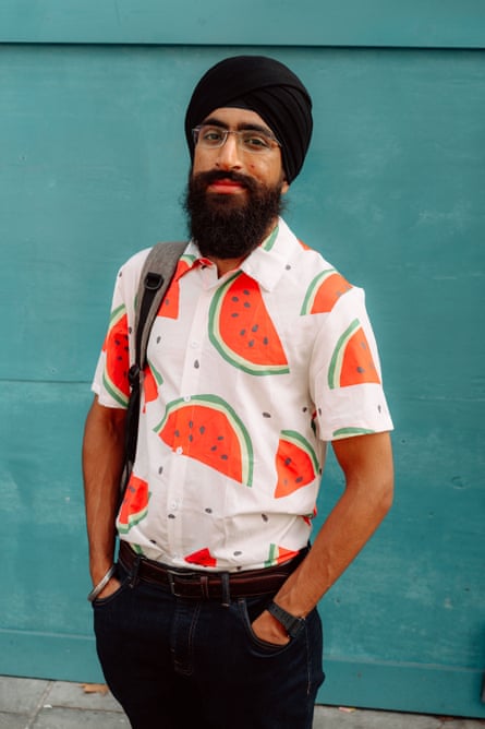 Jaiman in a white shirt covered in watermelons