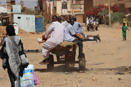 An injured man on a donkey-drawn cart