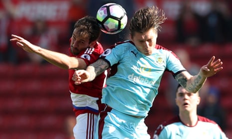 Middlesbrough’s Cristhian Stuani contests the ball with Burnley’s Jeff Hendrick.
