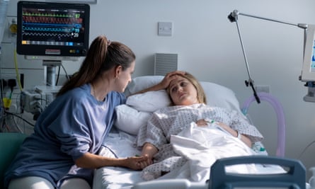 Lisa Waters (Ria Zmitrowicz) with Sandy Waters (Aisling Loftus).