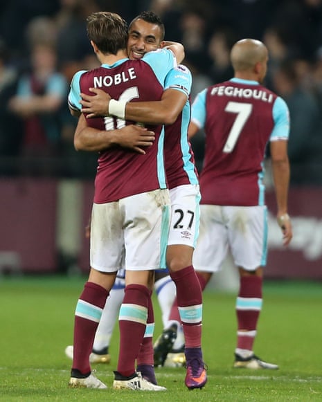 West Ham United’s Dimitri Payet and Mark Noble celebrate at the end of the game.