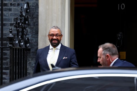 James Cleverly, the home secretary, leaving cabinet.