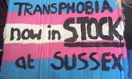 Placard reading: 'Transphobia now in stock at Sussex'