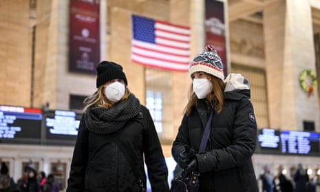 People wear face masks in Grand Central terminal in New York City in December 2022. 
