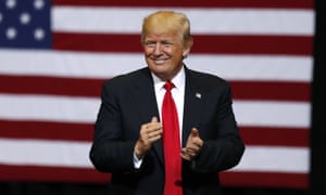 Donald Trump smiles at supporters as he arrives to speak at a rally in Cedar Rapids, Iowa, earlier this month.