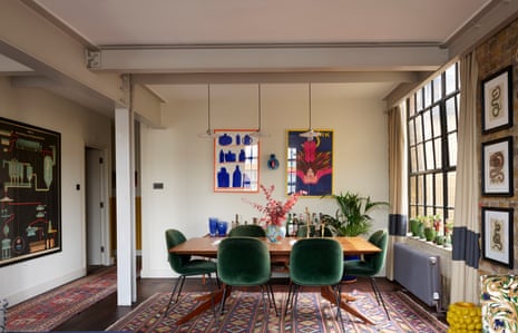 The eating  area, with a array  by Matthew Hilton for De la Espada and Gubi chairs. Extra colour comes from a coating  by Francesca Van Haverbeke (left) and a vintage Polish circus poster from 1977