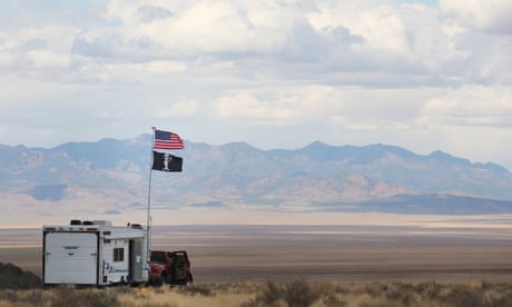 A camper with alien and American flags at a desert event in Nevada in 2019. 60 Minutes interviewed a number of credible witnesses about ‘unidentified aerial phenomena’.