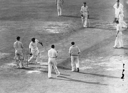 Australian cricketer Don Bradman is bowled for a duck by a googly from Hollies.
