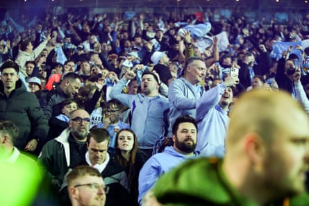 Coventry City fans celebrate promotion after Bobby Thomas’s late goal against Blackburn.