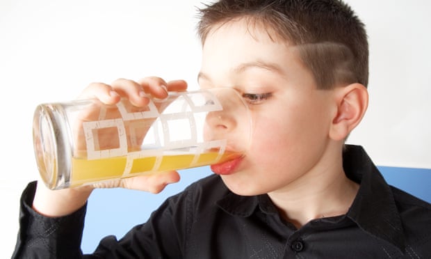 A child consumes a sugary drink