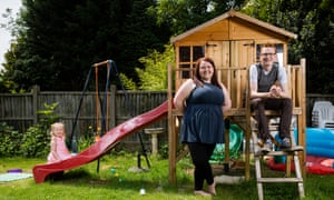 Adam Bucklow with partner Lyndsay and their daughter Bella in their garden in Nottingham