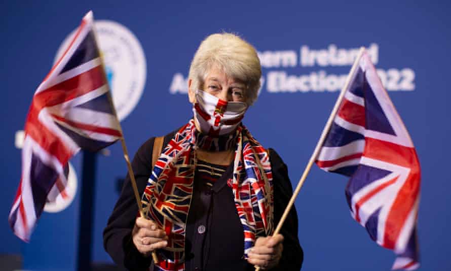 Anne Dixon supports her husband, Traditional Unionist Voice (TUV) candidate Billy Dixon (not pictured), counts today at the exhibition center