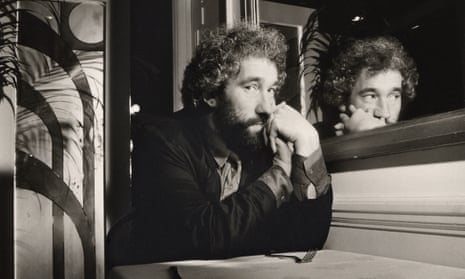 Simon Callow, photographed in 1985, sitting next to a mirror
