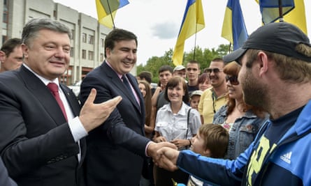 Ukraine’s President Petro Poroshenko, left, and Mikhail Saakashvili meet citizens in Odessa