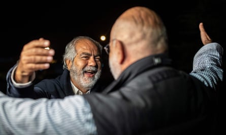 Altan greets his brother Mehmet after being released on 4 November.