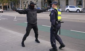 melbourne protesters police confrontation gather parliament officer outside between man anti lockdown barbour scott photograph