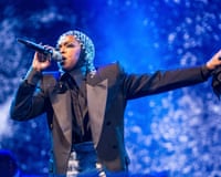 a woman performing onstage