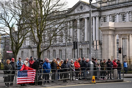 People in front of Belfast City Hall this morning, near the hotel where Joe Biden is staying in, waiting to see the president.
