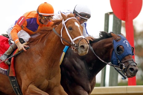 Further Ado and Flavien Prat race closely alongside Owen Almighty in a horse race