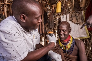 Maurice Albony checks Amoni Ekaale, Turkana, Kenya