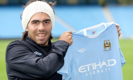 Carlos Tevez is unveiled by Manchester City in July 2009