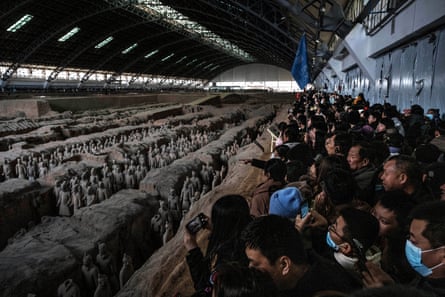 Visitors look at the terracotta warriors exhibition in Xi’an.