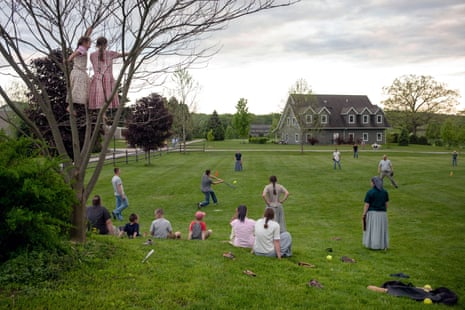 An impromptu community softball game comes together on the Foxhill community, Upstate New York