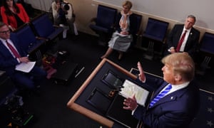 Donald Trump answers a question as Dr Deborah Birx and the health department’s under secretary for science and technology, William Bryan, listen during a daily taskforce briefing last month.