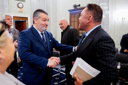 Republican senator Ted Cruz (left) shakes hands with Oscar De La Hoya on Wednesday before a US Senate commerce, science and transportation committee hearing on federal boxing laws on Capitol Hill in Washington.