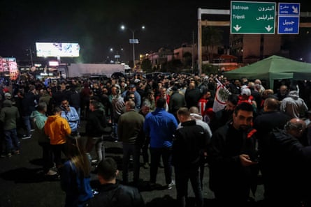 Lebanese Forces party block the main Byblos-Beirut highway to protest the killing of a local politician.