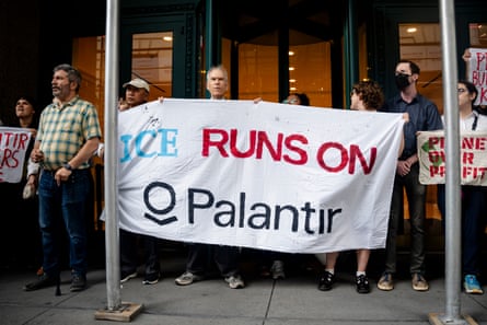 Protestors demonstrate outside of Palantir’s New York offices.