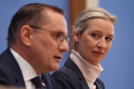 Alice Weidel, co-leader and chancellor candidate of the far-right Alternative for Germany (AfD), and AfD co-leader Tino Chrupalla, speak to the media the day after German parliamentary elections in February.