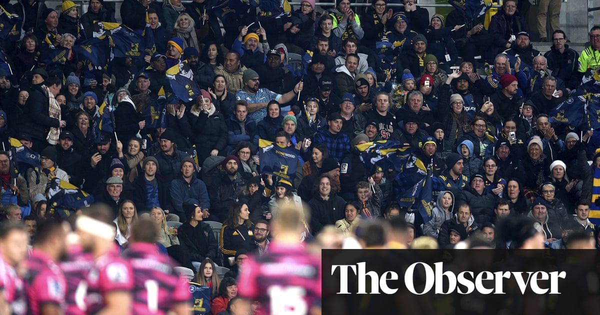 Shoulder to shoulder, New Zealand rugby fans cheer the return of crowds to live sport