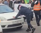 Driver allegedly rams into protester at Melbourne anti-racism rally β video