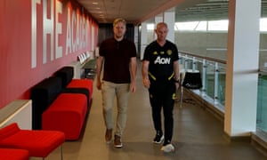 Academy head Nick Cox (left) with head of first-team development Nicky Butt. Cox devised the ways to keep the club’s young players active and involved.