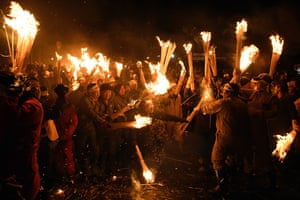 Nozawaonsen, Japan Participants rush forward with flaming sticks