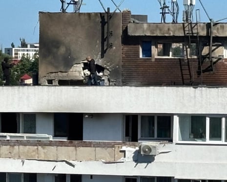 A view shows damages caused by a Russian drone hitting an apartment building in the eastern city of Galați, Romania.