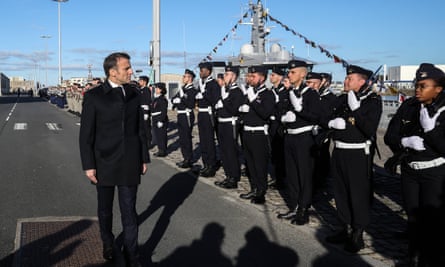 French president Emmanuel Macron reviewing troops at the marine base in Cherbourg, France, 19 January 2024