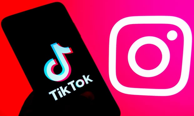 Photo illustration of Tiktok logo seen displayed on an android smartphone with an Instagram logo in the background
