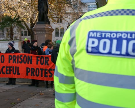 Just Stop Oil activists march in Westminster, central London, last month in solidarity with members who have been imprisoned